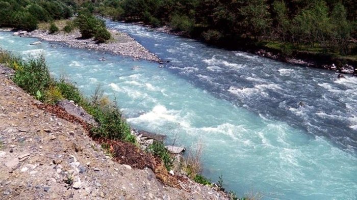 Two streams merge to form a river