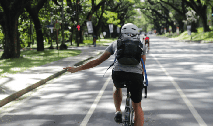 When should a driver yield to a pedestrian or bicyclist