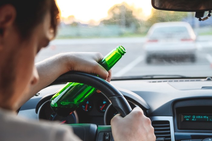 Driving alcohol drink ability while does hand